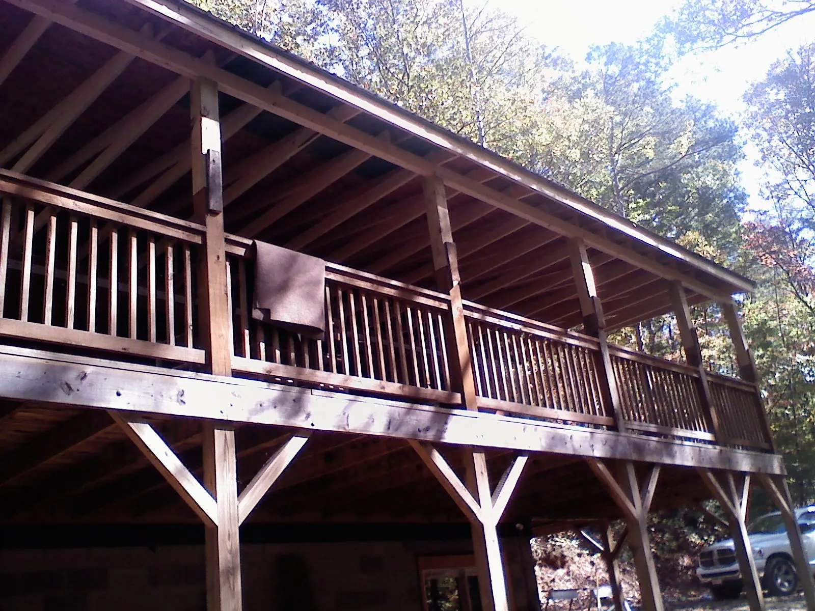 Timber framing under a new elevated porch and deck — Roof Leak Repair in Lake Delton by Roofing Brothers